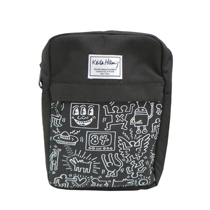 【KeithHaring】15804 縦型ショルダーバッグ 鞄 ショルダー 斜めがけ 軽量 キースヘリング ユニセックス 男女兼用 ブラック ホワイト 使いやすい かわいい ストリート 普段使い 便利 中学生 高校生 大学生